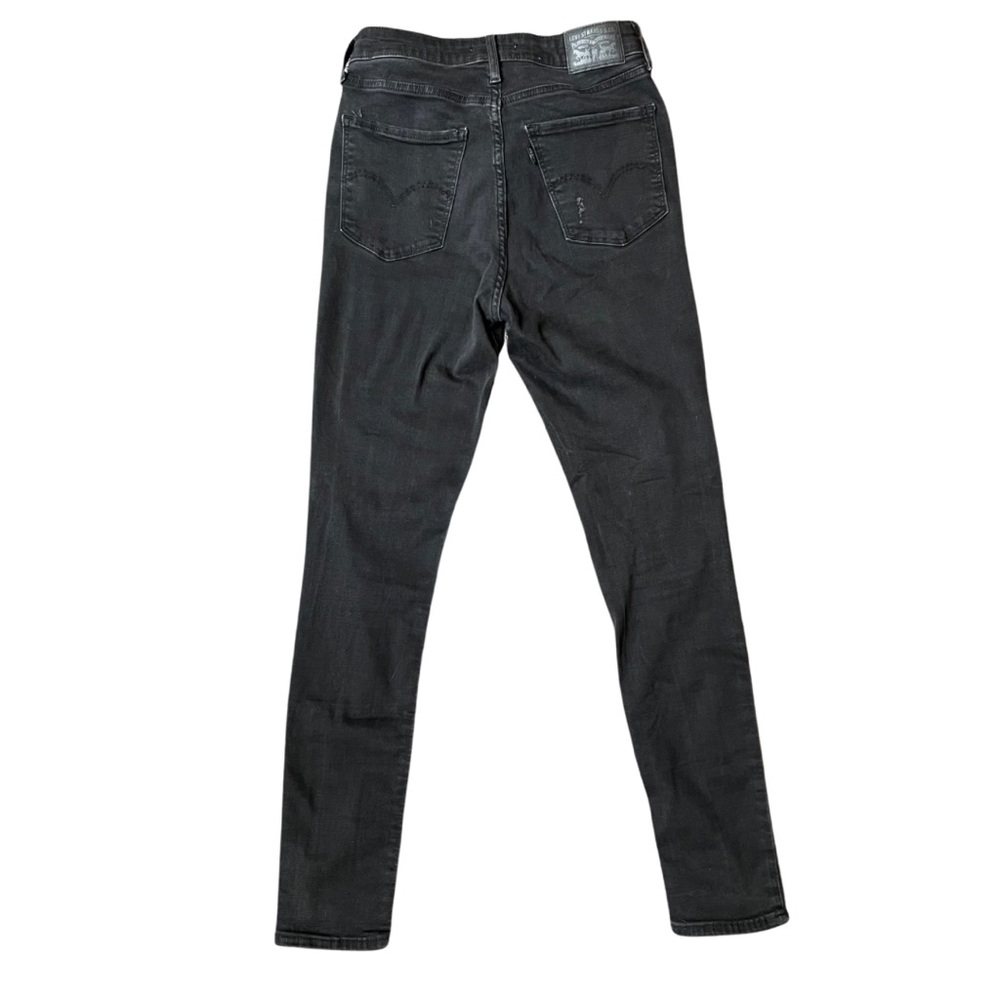 Levi’s 721 High Rise Distressed Black Skinny Jeans